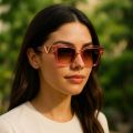Stylish Pink Transparent Frame Women’s Sunglasses – Golden V Side Logo, UV Protection, Fashion Look. 