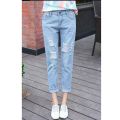 Korean style ripped nine-point jeans women's trousers mid-waist 9-point student casual straight-leg pants. 