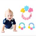 Rattle Shape Silicone Baby Teether – Soft & Safe Teething Toy for Infants – BPA-Free, Non-Toxic, and Easy to Grip. 