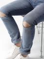 The-Ajmery Medium Blue Ripped Denim Jeans For Men. 