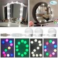 Vanity Lights for Mirror seems Hollywood lights Backlit as Portable LED Bulb Studio Glow for Professional Makeup Stick on Mirror having Dimmable Brightness with 10 Bulbs and 3 Modes White off-white & Warm 12 different color with remote control system. 