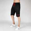 Black Quick Dry Shorts with Two horizontal Red Lines. 
