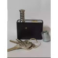 100% Secure Motorcycle Side Lock - Black L Key Anti-Theft Push Lock. 