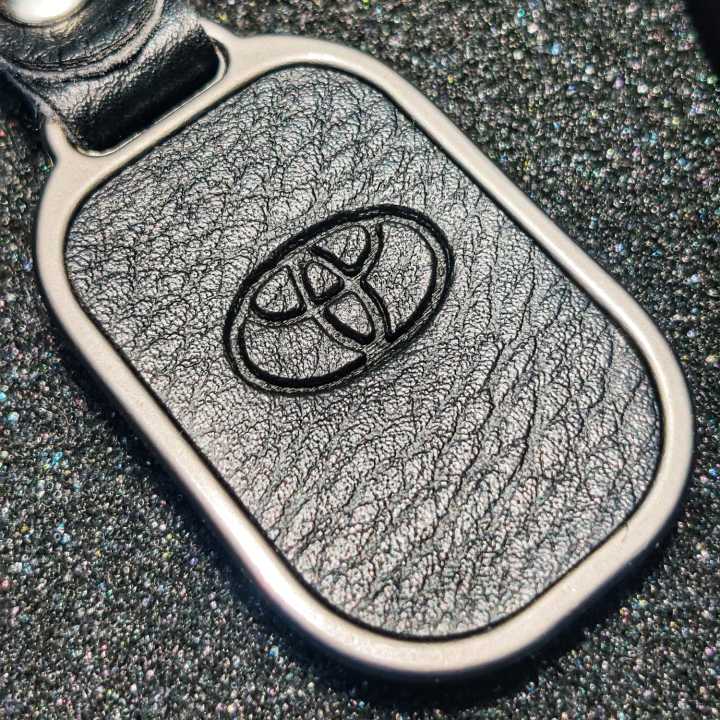 Toyota%20Metal%20and%20Leather%20Premium%20Keychain%20For%20Toyota%20Yaris%20Vitz%20Prius%20Landcruiser%20Prado%20Mark%20X%20Camry%20Cars%20and%20Bikes-%20Black%20-%20Image%202