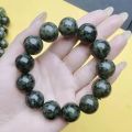 chengli Yaowang stone natural active magnetic single circle bracelet serpentine Tibetan jade olive green meteorite graphite green jade bracelet. 