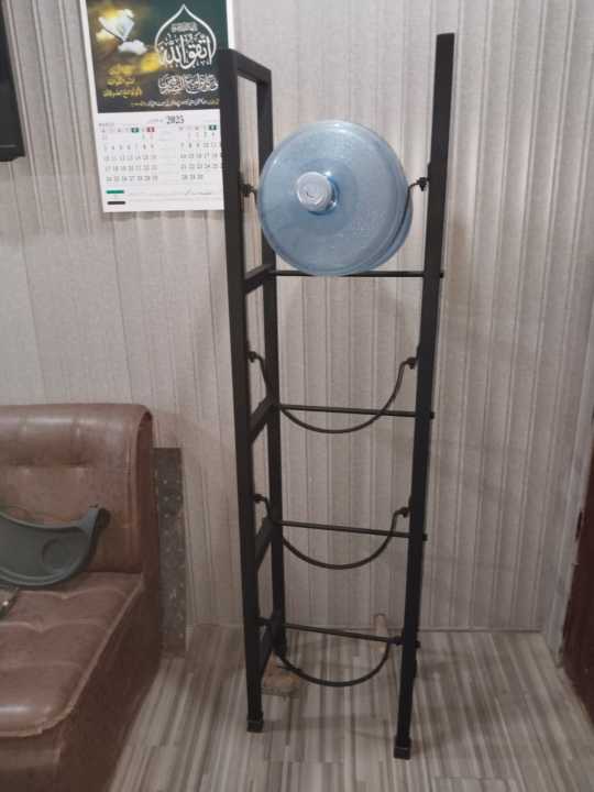 Water%20Bottle%20Storage%20Stand,%204-Tier%20Water%20Bottle%20Holder,%205%20Gallons%20Heavy%20Duty%20Water%20Jug%20Rack%20for%20Kitchen%20Home%20and%20Office%20Easy%20To%20Assemble%20Black%20-%20Image%205