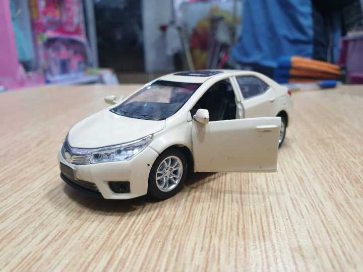 Toyota%20Corolla%20Grande%201:36%20scale%20diecast%20model%20toy%20car%20collection%20Random%20Color%20pull%20back%20action%20-%20Image%204