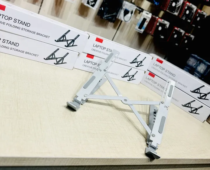 Portable%20Aluminum%20Foldable%20Laptop%20Metal%20Stand%20Adjustable%20Height%20Folding%20Laptop%20Holder%20Solid%20Stand%20With%20Anti%20Slip%20Rubber%20Grips%20-%20Silver%20-%20Image%203