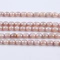Factory price 8-9mm white purple pink color rice shape pearl beads natural freshwater pearl strand for jewelry making. 