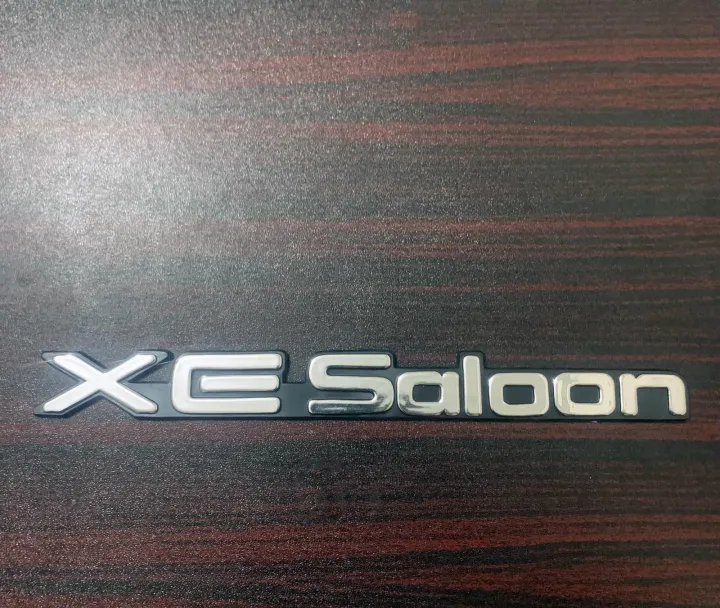 Pack%20of%202%20COROLLA%20XE-Saloon%20Monogram%20Plastic%20Emblem%20For%20Toyota%20Corolla%2089-94%20-%20Image%202