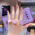 For Samsung Galaxy S10 Plus Back Cover with Love Heart Chain Wrist Strap Fashion Bracelet Shiny Plating Bumper Protective Case Silicone Shockproof Mobile Phone Cases. 