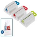 Pack of 4 Plastic Rotary Toothpaste Squeezer Device - Durable Rolling Tube Paste Squeezer & Dispenser - Manual Rotary Paste Holder. 