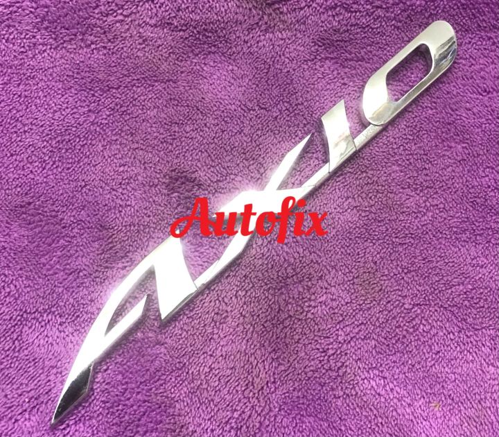 Toyota Axio Rear Plastic Emblem Silver Chrome (Local) 01 Piece | Daraz.pk