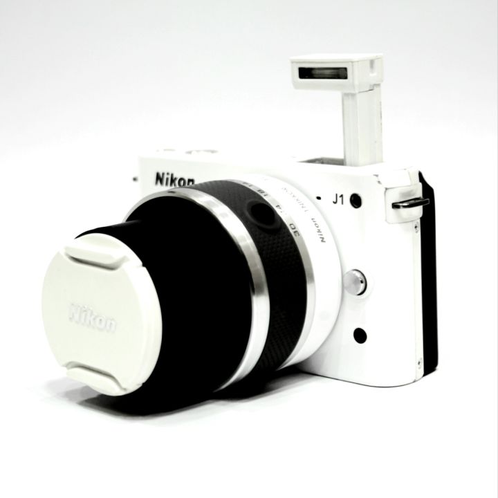 Nikon J1 Mirrorless Camera with 10-30 mm lens - White