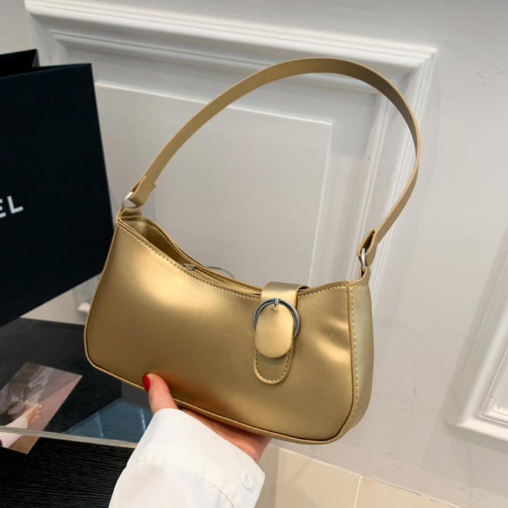 Ladies gold handbags deals
