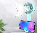 Portable electric rechargeable handy cooling fan with rechargeable cell. 