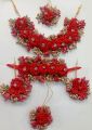 Artificial Flowers Bridal Jewelry Set with Choker Necklace, Earrings, Matha Tikka and 1 hand Bracelet attached With Ring for Bride Fashionable design Wedding Engagement Mehndi for wear. 