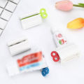 Pack of 4 Plastic Rotary Toothpaste Squeezer Device - Durable Rolling Tube Paste Squeezer & Dispenser - Manual Rotary Paste Holder. 