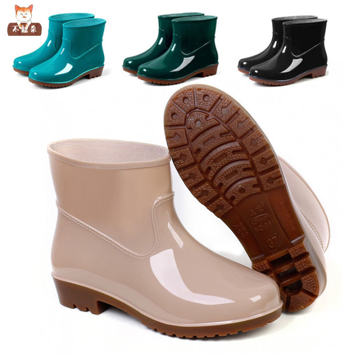 Rain boots women s low tube non slip men s rain boots short tube plus velvet water shoes men and women fashion rain boots work shoes mid tube waterproof shoes Daraz.pk