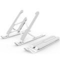 Foldable laptop stand for bed lightweight ventilate portable laptop stand with 7-Level adjustable Height for 11 - 15 Inch notebook stand ABS High Quality plastic laptop stand with aluminum center rod and non-slip silicon grip. 