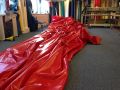 RED 100% waterproof Tarpal ,UV stabilized,durable,high quality,edge to edge borders double stitched with hooks on every 3 feet distance on sides ,Used for sun shade and other outdoor activities.. 
