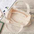 Japanese simple original ecological cotton canvas tote bag small solid color hand bag lunch box bag lunch bag lunch bag. 