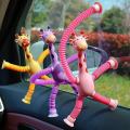 Telescopic Giraffe Suction Cup Toy, (1PC Random Colors) Cute Giraffe Stretch Tube Stress Relief Sensory Toy in Four Different Colors Suction Cup Giraffe Pop Tube Sensor Fidget Toy For Kids, Deformable Sensory Suction Cup Plastic Toy, Suction Robot Toy. 
