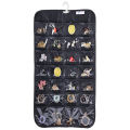 Efficient Hanging Jewelry Organizer with Embossed Pattern and 28 Clear PVC Pockets: Organize Your Jewelry in Style. 