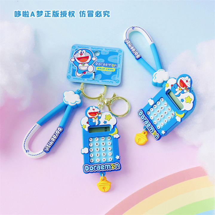 Genuine Doraemon computer keychain, mini handheld calculator, Tinker Bell pendant, student school bag ornament