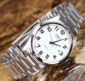CASIO WHITE DIAL WITH DATE & SILVER BRACELET MEN'S WATCH - MTP-1183A-7BDF. 