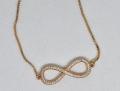 24 carat Singapore gold plated women wrist Bracelet with bow tie  shaped zerkone fitting. 