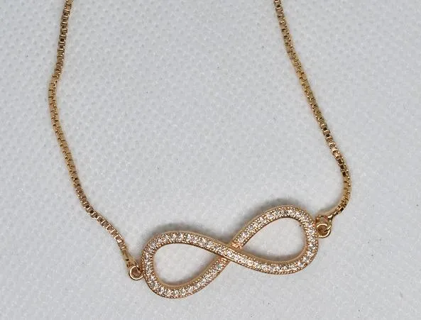 24%20carat%20Singapore%20gold%20plated%20women%20wrist%20Bracelet%20with%20bow%20tie%20%20shaped%20zerkone%20fitting%20-%20Image%203