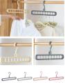 Plastic hanger with multi holes. 