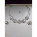 Stylish Zircon set with white pearls for women. 