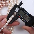Factory price 8-9mm white purple pink color rice shape pearl beads natural freshwater pearl strand for jewelry making. 