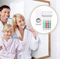 Toothpaste Dispenser with Tooth Brush Holder - White. 