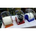 Plastic wristwatch box  made of clear acrylic, which provides a transparent and elegant look  box is designed specifically for presenting watches as gifts or for storing them securely  box features a crystal glass lid, allowing for a clear. 