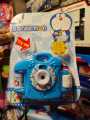 Kids Mini Doraemon Projector Camera Toy For Kids/ Kids Cell Operated LED Mini Image Projector Camera Easily Switch Image By Pressing Button/ LED Projector Light With 24 Animal Images Pattern With 3 Random Chips Easy To Carry Amazing FOR bedtime Story. 