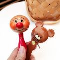 Baby rattle bear rattle version clapper Japanese toy grip sand hammer to appease Anpanman school baby. 
