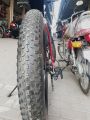 Fat Tyre Bike by PLUS - Adventure Redefined, 21 Speed, Shimano Gears, Front shock double disk 10 gears, 26 Inches, Aluminum Frame. 