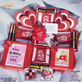 Customize Chocolate`s Gift Box Including 12 Big Chocolates , Fairy lights , Teddy Bear , Printed Name , Wishes Card , Gift Wrappping i.e Eid Gift , Chocolate`s Gift Box  ,  Ramzan Gift , Special Gift For Your Lover , Birthday Gift , Ramzan Gift ,. 