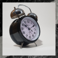 Loud Twin Bell Alarm Clock Battery Operated Silver Round Shape with Night Vision Dial. 