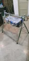 baby cradle swing steel stand with clothe for sleeping. 