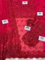 An elegant saree featuring bejewelled neckline and delicate embroideries, pearls, diamonites, sequins and hand cut 3D floral appliques with signature sophisticated cutwork detaling in an ethereal shade of Red.. 