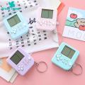 Green Home Gaming Console Key Chain Design Handheld Game Player with Keychain. 