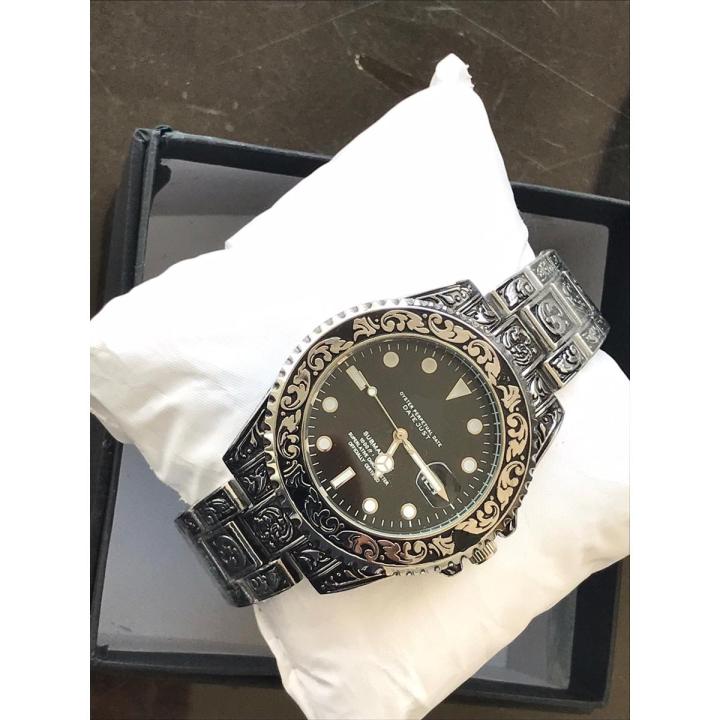 Engraved watch