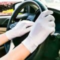 white summer fabric gloves for car drivers and bikers. 