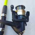 Yumoshi JM200 Sleek Lightweight Electroplating Fishing Reel With Fishing Line. 