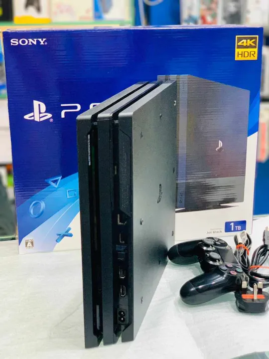 Sony%20PlayStation%204%20Pro%20PS4%20Pro%201TB%20HDD%20Official%201%20Wireless%20Controller%20with%20all%20Accessories%20-%20Image%204