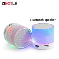 Mini Portable Bluetooth Rechargeable Speaker with LED Light, SD Card, USB, and FM Radio. 